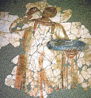Romano del siglo I comiendo calçotada